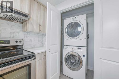 152 Falconridge Crescent Ne, Calgary, AB - Indoor Photo Showing Laundry Room