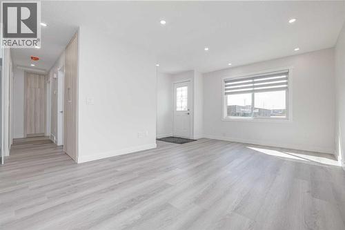 152 Falconridge Crescent Ne, Calgary, AB - Indoor Photo Showing Other Room