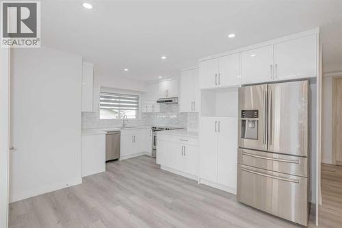 152 Falconridge Crescent Ne, Calgary, AB - Indoor Photo Showing Kitchen With Upgraded Kitchen
