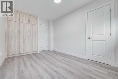 152 Falconridge Crescent Ne, Calgary, AB - Indoor Photo Showing Other Room