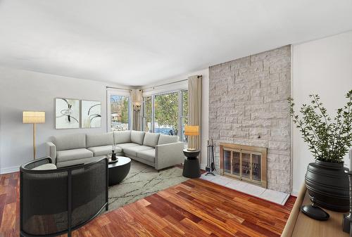Living room - 224 Bermuda Drive, Beaconsfield, QC - Indoor Photo Showing Living Room With Fireplace
