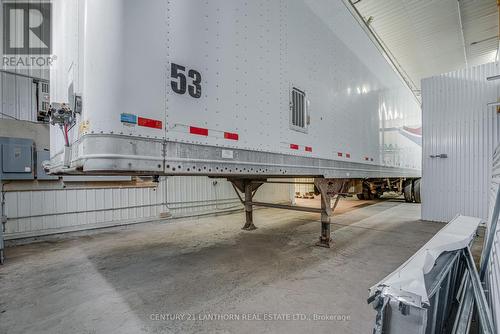 large bay with 14' drive in door - 19 Terry Fox Drive, Champlain, ON 