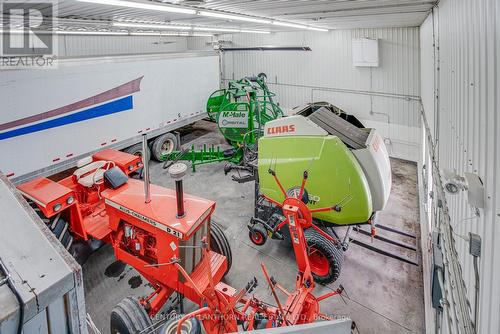 large bay with 14' drive in door - 19 Terry Fox Drive, Champlain, ON 