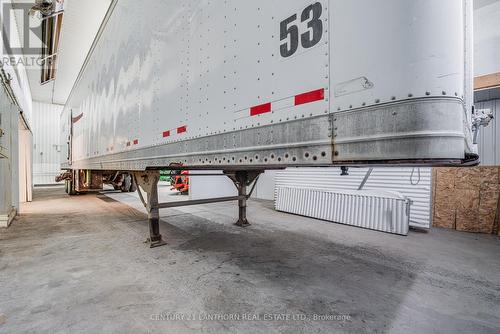 large bay with 14' drive in door - 19 Terry Fox Drive, Champlain, ON 