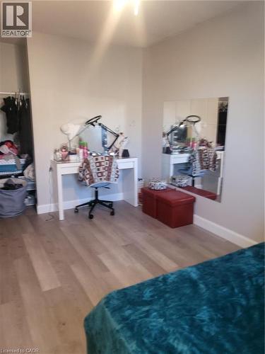 Bedroom featuring wood finished floors and baseboards - 18 Rosewell Street, Hamilton, ON - Indoor