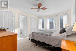 Primary suite with tons of natural light. - 
