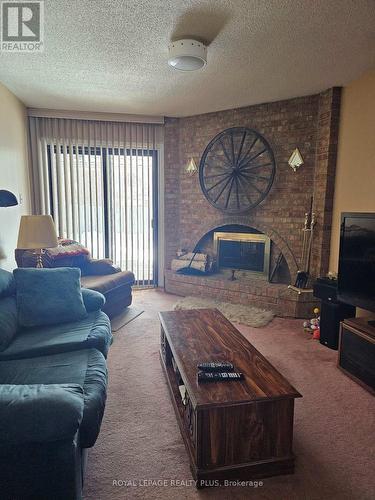 4170 Treetop Crescent, Mississauga, ON - Indoor Photo Showing Living Room With Fireplace