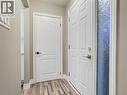Entrance foyer with wood finished floors and baseboards - 55 Silver Aspen Crescent, Kitchener, ON  - Indoor Photo Showing Other Room 