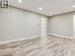 Spare room featuring recessed lighting and light wood finished floors - 