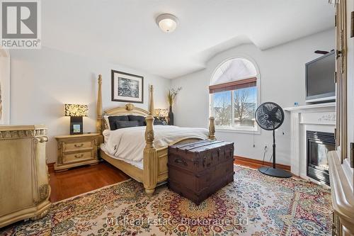 Primary Bedroom with fireplace and ensuite - 84 Porter Court, Guelph (Pineridge/Westminster Woods), ON - Indoor Photo Showing Bedroom