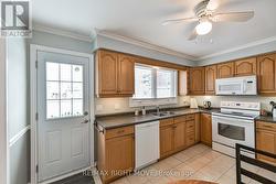 Back door leading to deck and back yard - 