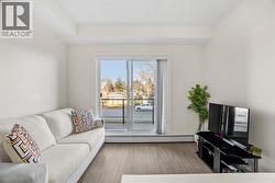 9-foot ceilings and large windows that create a spacious, airy feel - 