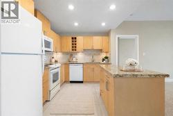 Concrete high-rise condo offering panoramic east-facing views of downtown - 