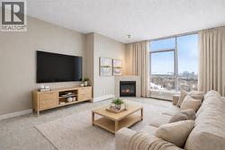 Features 9-foot ceilings and large windows that flood the home with natural light - 