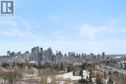Offering panoramic east-facing views of downtown Calgary and Shaganappi Golf Course - 