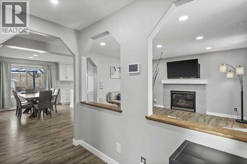 39 Prestwick Heath Se, Calgary, AB - Indoor With Fireplace