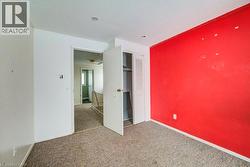 Unfurnished bedroom with carpet floors, a closet, and a textured ceiling - 