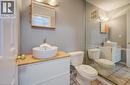 Bathroom with vanity and tile patterned floors - 54 Nicklaus Drive, Hamilton, ON  - Indoor Photo Showing Bathroom 
