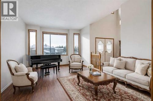 Virtual staged furniture - Living room - 106 Sienna Hills Drive Sw, Calgary, AB - Indoor Photo Showing Living Room