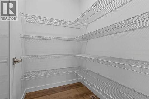 90 Heritage Circle, Cochrane, AB - Indoor With Storage