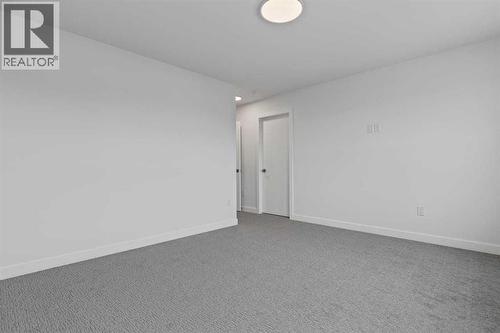 90 Heritage Circle, Cochrane, AB - Indoor Photo Showing Other Room