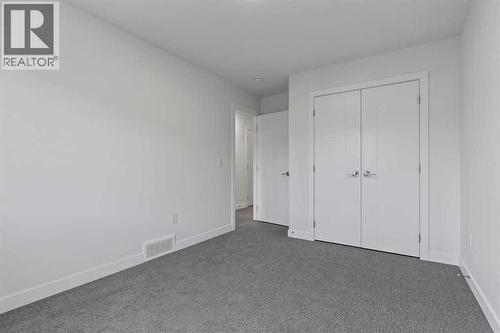 90 Heritage Circle, Cochrane, AB - Indoor Photo Showing Other Room