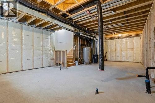 90 Heritage Circle, Cochrane, AB - Indoor Photo Showing Basement