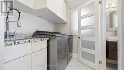 Laundry room full o storage and heated floor - 
