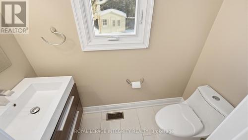 Powder room with heated floor - 1055 Plante Drive, Ottawa, ON - Indoor Photo Showing Laundry Room