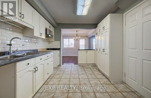 54 Nicklaus Drive, Hamilton (Vincent), ON - Indoor Photo Showing Kitchen With Double Sink