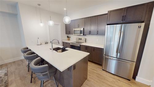 212-355 Legacy Lookout, Cranbrook, BC - Indoor Photo Showing Kitchen With Stainless Steel Kitchen With Upgraded Kitchen