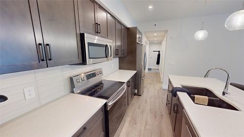 212-355 Legacy Lookout, Cranbrook, BC - Indoor Photo Showing Kitchen With Double Sink With Upgraded Kitchen