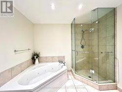 Ensuite has separate shower and jacuzzi tub - 