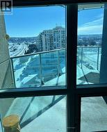 Primary bedroom view to patio and lake - 