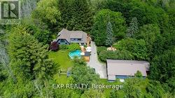 Aerial view of house, fire pit and detached garage - 