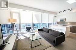 Kitchen & Living Room w/Floor to Ceiling Windows - 