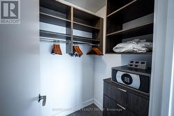 Primary Bedroom Walk-In Closet - 