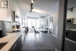 Kitchen and Living Room w/Floor to Ceiling Windows - 