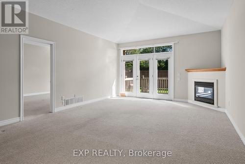 23 - 5595 Drummond Road, Niagara Falls (Hospital), ON - Indoor With Fireplace