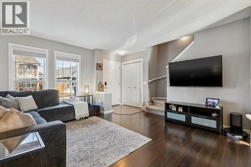 322 Cranford Park Se, Calgary, AB - Indoor Photo Showing Living Room