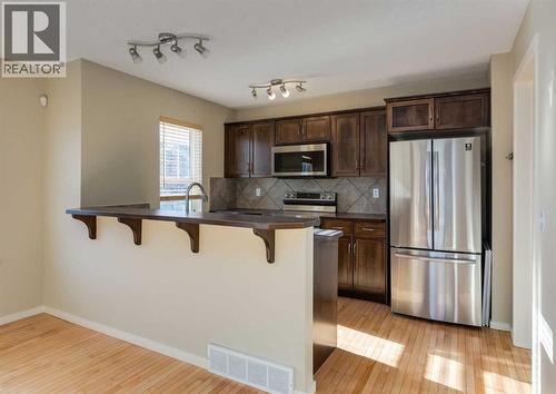 236 Silverado Drive Sw, Calgary, AB - Indoor Photo Showing Kitchen