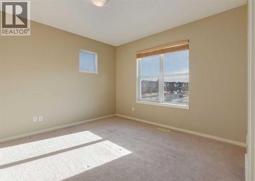 236 Silverado Drive Sw, Calgary, AB - Indoor Photo Showing Other Room