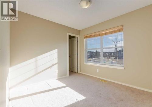 236 Silverado Drive Sw, Calgary, AB - Indoor Photo Showing Other Room