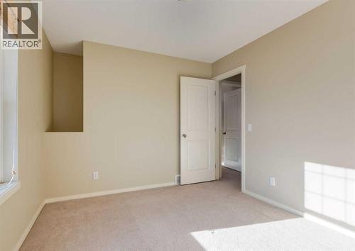 236 Silverado Drive Sw, Calgary, AB - Indoor Photo Showing Other Room