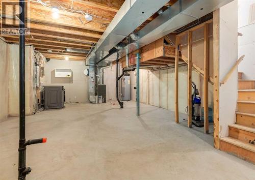 236 Silverado Drive Sw, Calgary, AB - Indoor Photo Showing Basement