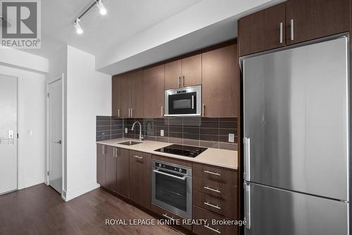 906 - 2550 Simcoe Street N, Oshawa, ON - Indoor Photo Showing Kitchen With Stainless Steel Kitchen