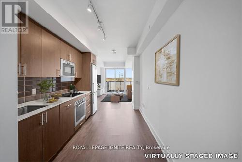 906 - 2550 Simcoe Street N, Oshawa, ON - Indoor Photo Showing Kitchen