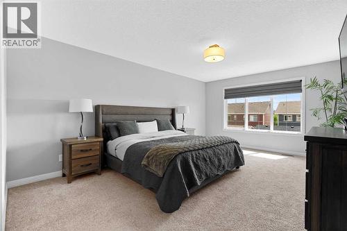 103 Masters Rise Se, Calgary, AB - Indoor Photo Showing Bedroom