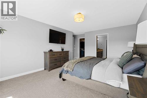 103 Masters Rise Se, Calgary, AB - Indoor Photo Showing Bedroom