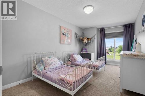 103 Masters Rise Se, Calgary, AB - Indoor Photo Showing Bedroom